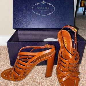 Brown leather Prada heels.
